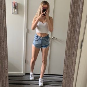 Light wash shorts with bead detailing